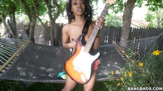 Naked ebony Skyler Nicole playing guitar
