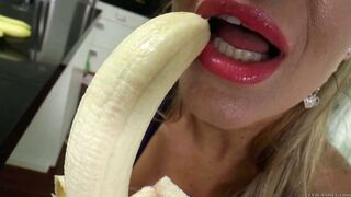 Busty blonde mom Phoenix Marie teases with a banana