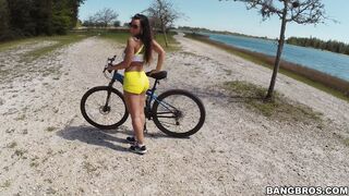 Bike riding MILF Lisa Ann shows off her tits and booty