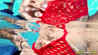 Little beauty Amirah Adara swimming in a skimpy red bikini