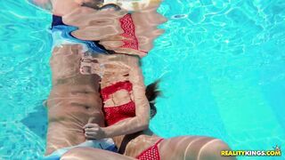 Little beauty Amirah Adara swimming in a skimpy red bikini