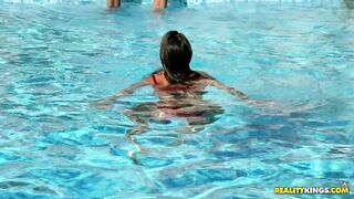 Little beauty Amirah Adara swimming in a skimpy red bikini