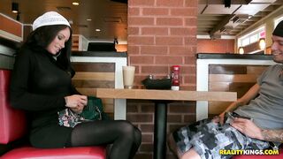Brunette babe Raven Bay going naughty in a restaurant