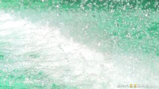 Luscious blonde Courtney Taylor posing naked in a pool