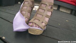 Amazing redhead Sophia Locke shows her sweet ass off outside