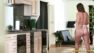 Busty tease Skyler Luv makes breakfast wearing only an apron