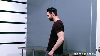 Cassidy Banks and Kenzie Taylor lined up topless in police station