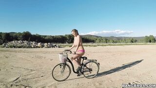 Busty Czech blonde Kathy Anderson riding her bike butt naked