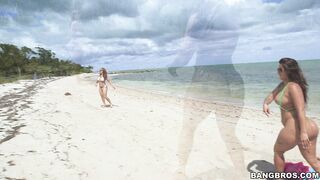 Big booty ebony babes Spicy J and Miss Raquel frolicking on the beach