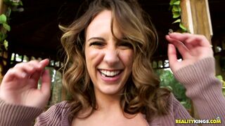 Busty amateur Layla London teasing in a gazebo outside