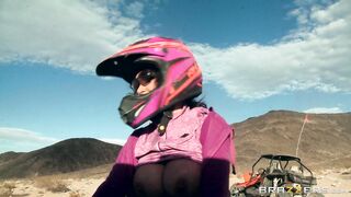 Busty mom Nikki Benz riding sandy buggy through the desert topless