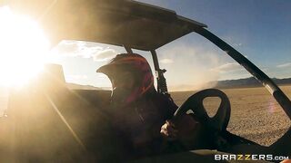 Busty mom Nikki Benz riding sandy buggy through the desert topless