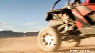 Busty mom Nikki Benz riding sandy buggy through the desert topless