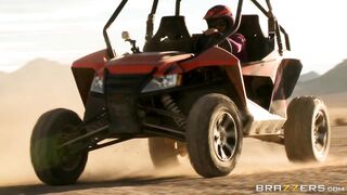 Busty mom Nikki Benz riding sandy buggy through the desert topless