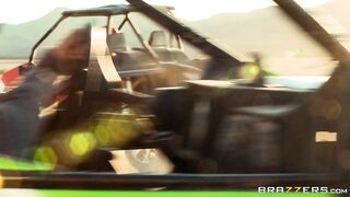 Busty mom Nikki Benz riding sandy buggy through the desert topless