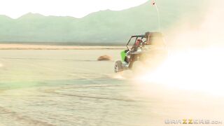 Busty mom Nikki Benz riding sandy buggy through the desert topless