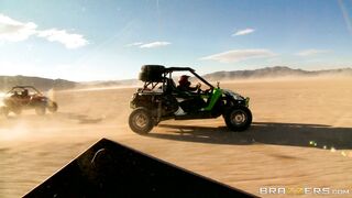 Busty mom Nikki Benz riding sandy buggy through the desert topless
