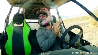 Busty mom Nikki Benz riding sandy buggy through the desert topless