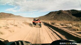 Busty mom Nikki Benz riding sandy buggy through the desert topless