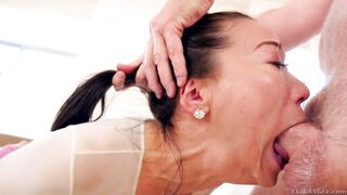 Asian gal Kalina Ryu drools on a big dick in this face fucking session