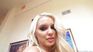 Kenzie Taylor poses and she shakes her large tits