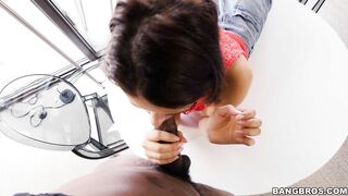 Izzy Bell is sucking a large hard black pecker close up