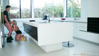 Kayla Kayden pulls a big cock while her tits are massaged