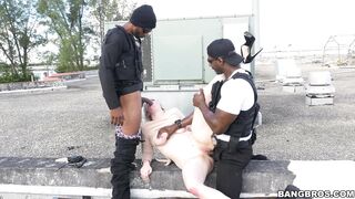 Kiki Parker is with two black guys on the roof, fucking