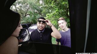 Bella Danger is giving a blow job inside the car