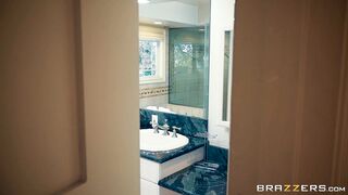 Brandi Love is getting naked in the shower and wet