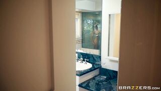Brandi Love is getting naked in the shower and wet