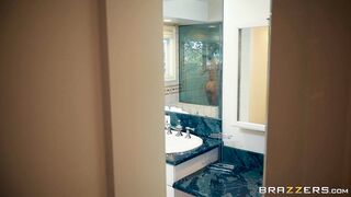 Brandi Love is getting naked in the shower and wet