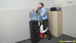 Aubrey Rose is giving a blow job to her partner.