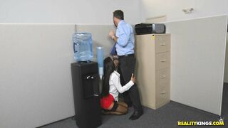 Aubrey Rose is giving a blow job to her partner.