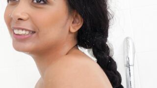 Aaliyah Hadid is in the shower, posing solo for us