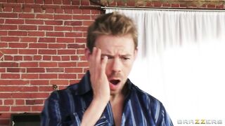 Big boobed blonde Jacky Joy sticking her shaved cunt with a big glass dildo