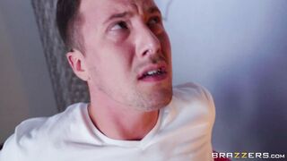 Amia Miley in sexy outfit posing in front of her ex-husband