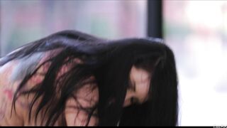 Romi Rain enjoys riding the big black obelisk