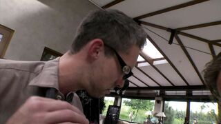 Busty Mary Wet serves two big cock with her mouth