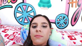 Audrey Holiday in fishnet stockings demonstrates her asshole