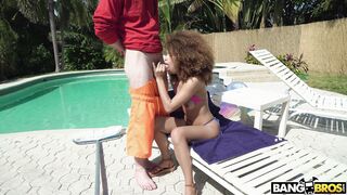 Ebony Cecilia Lion is sucking cock poolside