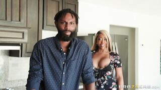 Ebony Moriah Mills is sucking the white cock in the kitchen