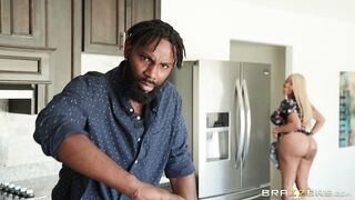 Ebony Moriah Mills is sucking the white cock in the kitchen