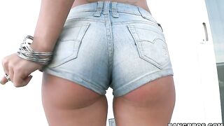 Holly Taylor wearing tight jeans shorts demonstrating her body