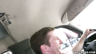 Tasha Reign demonstrates her large tits in the car