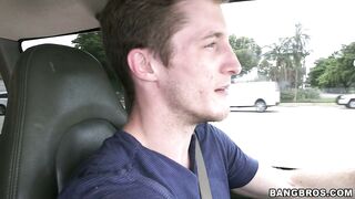 Tasha Reign demonstrates her large tits in the car