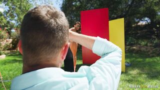 Brunette Rachel Starr poses outdoors