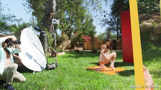 Brunette Rachel Starr poses outdoors