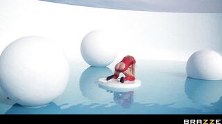 Nikki Benz posing nude in the water