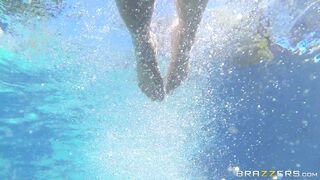Holly Halston relaxing in the pool